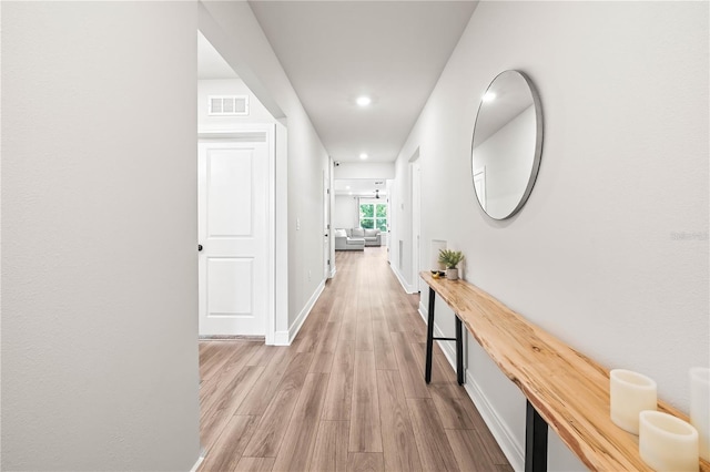 30273 Marquette Ave, Wesley Chapel, FL 33545 - corridor with wood finished floors, baseboards, and recessed lighting