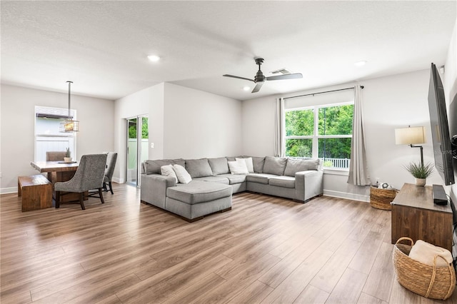 30273 Marquette Ave, Wesley Chapel, FL 33545 - living room with wood finished floors, ceiling fan, baseboards, and recessed lighting