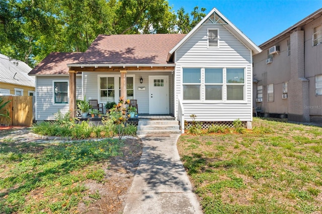 2911 N Jefferson St, Tampa, FL 33602 - bungalow featuring a porch and roof with shingles