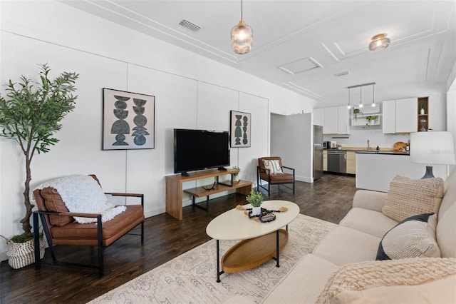 2911 N Jefferson St, Tampa, FL 33602 - living room with attic access, dark wood finished floors, and baseboards