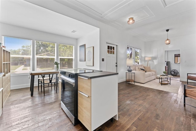 2911 N Jefferson St, Tampa, FL 33602 - kitchen featuring dark countertops, stainless steel electric range oven, dark wood-type flooring, and plenty of natural light