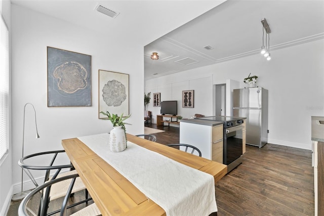 2911 N Jefferson St, Tampa, FL 33602 - dining space featuring attic access, dark wood finished floors, and baseboards