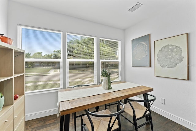 2911 N Jefferson St, Tampa, FL 33602 - dining space featuring baseboards, healthy amount of natural light, and dark wood-style floors