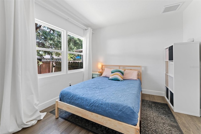 2911 N Jefferson St, Tampa, FL 33602 - bedroom featuring wood finished floors and baseboards