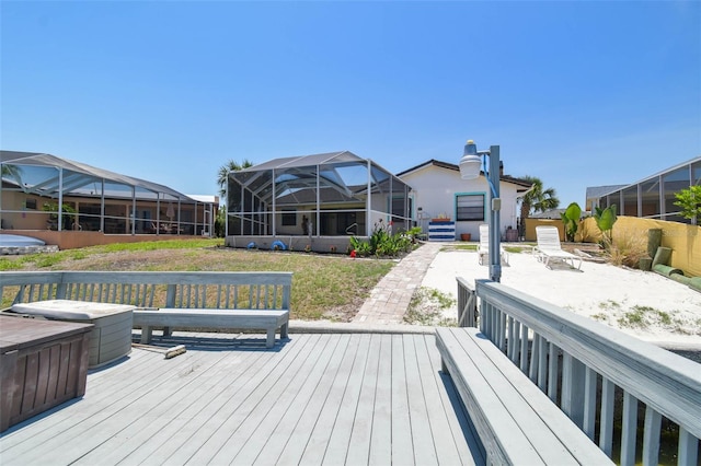 6322 Cocoa Ln, Apollo Beach, FL 33572 - wooden deck with a lanai and a residential view