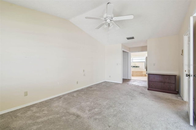 6322 Cocoa Ln, Apollo Beach, FL 33572 - unfurnished room with ceiling fan, baseboards, carpet floors, and lofted ceiling