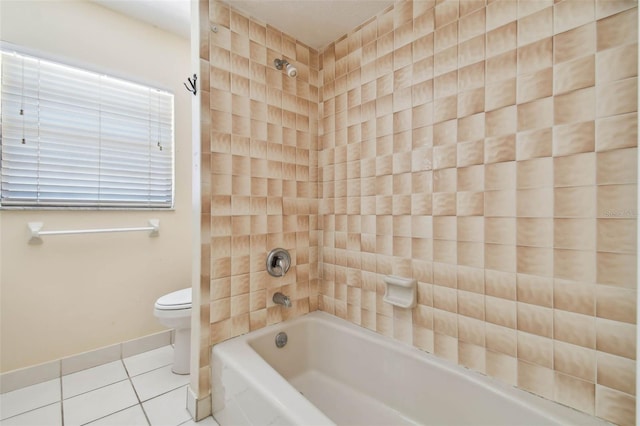 6322 Cocoa Ln, Apollo Beach, FL 33572 - bathroom featuring tile patterned flooring, toilet, shower / tub combination, and baseboards