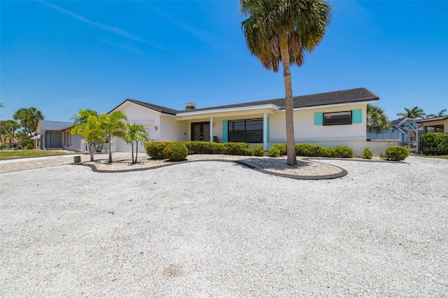 6322 Cocoa Ln, Apollo Beach, FL 33572 - single story home with stucco siding, concrete driveway, and an attached garage