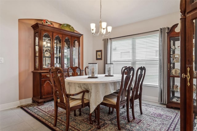 6555 Sparkling Way, Wesley Chapel, FL 33545 - dining area featuring a chandelier, baseboards, and lofted ceiling