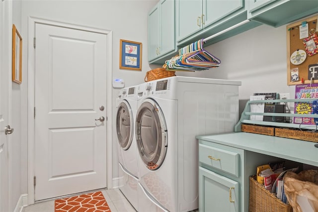 6555 Sparkling Way, Wesley Chapel, FL 33545 - laundry area featuring cabinet space, independent washer and dryer, and light tile patterned flooring