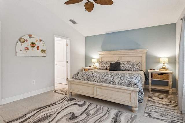 6555 Sparkling Way, Wesley Chapel, FL 33545 - bedroom with light tile patterned flooring, vaulted ceiling, baseboards, and ceiling fan