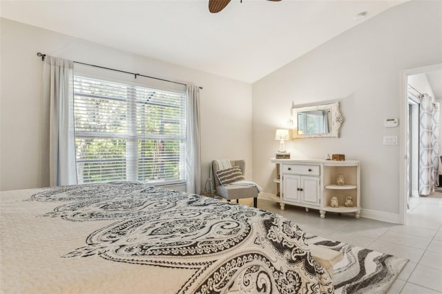 6555 Sparkling Way, Wesley Chapel, FL 33545 - bedroom featuring lofted ceiling, light tile patterned floors, baseboards, and ceiling fan