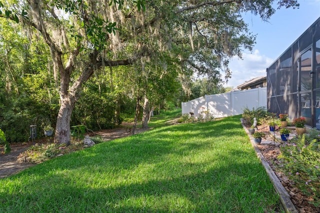 6555 Sparkling Way, Wesley Chapel, FL 33545 - view of yard featuring a lanai