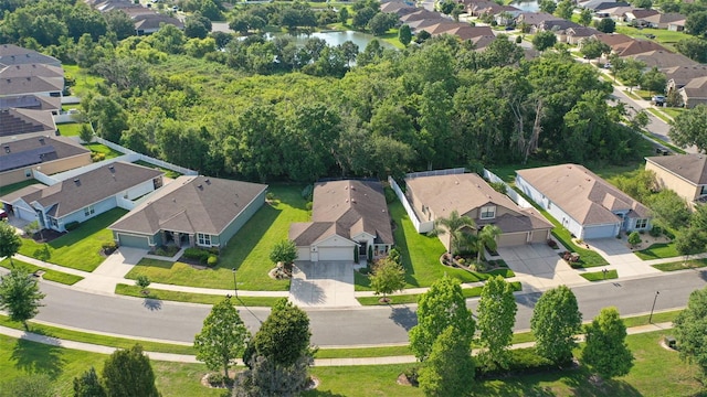 6555 Sparkling Way, Wesley Chapel, FL 33545 - aerial perspective of suburban area featuring a large body of water