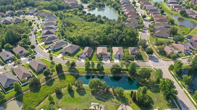 6555 Sparkling Way, Wesley Chapel, FL 33545 - aerial view of property and surrounding area with nearby suburban area and a nearby body of water