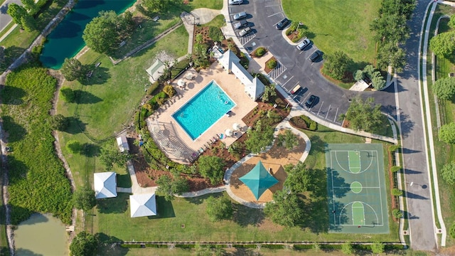 6555 Sparkling Way, Wesley Chapel, FL 33545 - aerial view of property and surrounding area with a pool area and a nearby body of water