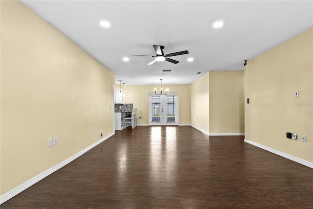 9780 Allen Rd, Lithia, FL 33547 - unfurnished living room featuring a ceiling fan, a chandelier, recessed lighting, baseboards, and dark wood-style flooring