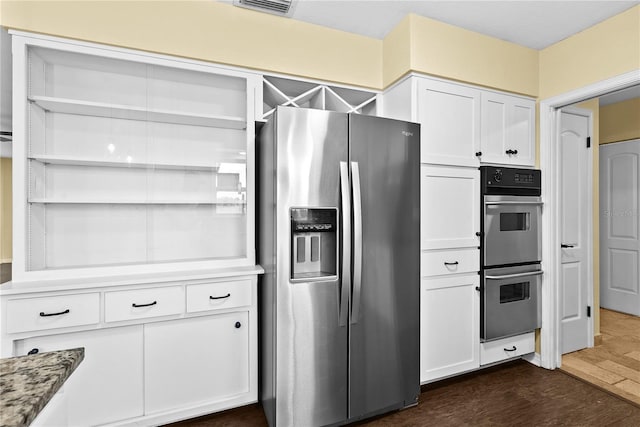 9780 Allen Rd, Lithia, FL 33547 - kitchen with appliances with stainless steel finishes, open shelves, dark wood-style floors, and white cabinetry