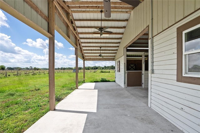 9780 Allen Rd, Lithia, FL 33547 - view of patio with a ceiling fan, a view of countryside, and an exterior structure