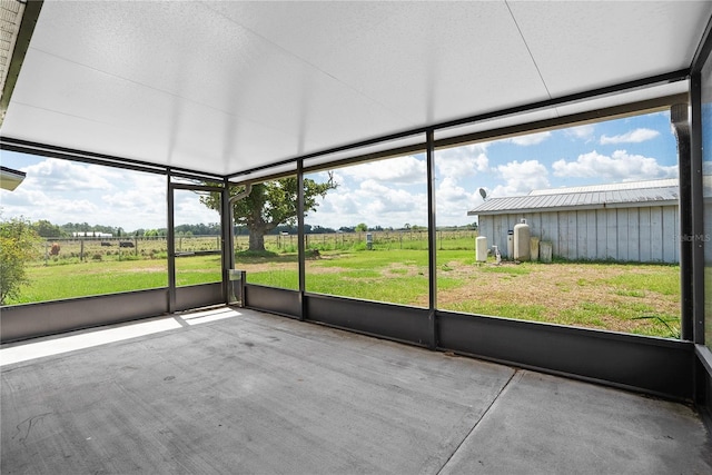 9780 Allen Rd, Lithia, FL 33547 - unfurnished sunroom with a view of countryside