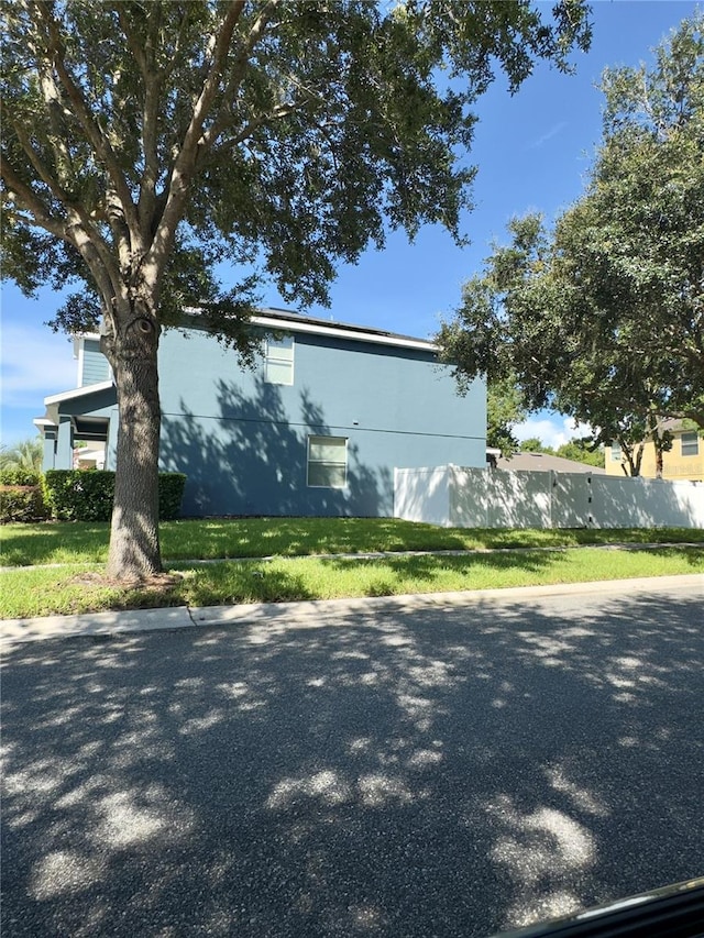 view of side of home featuring stucco siding