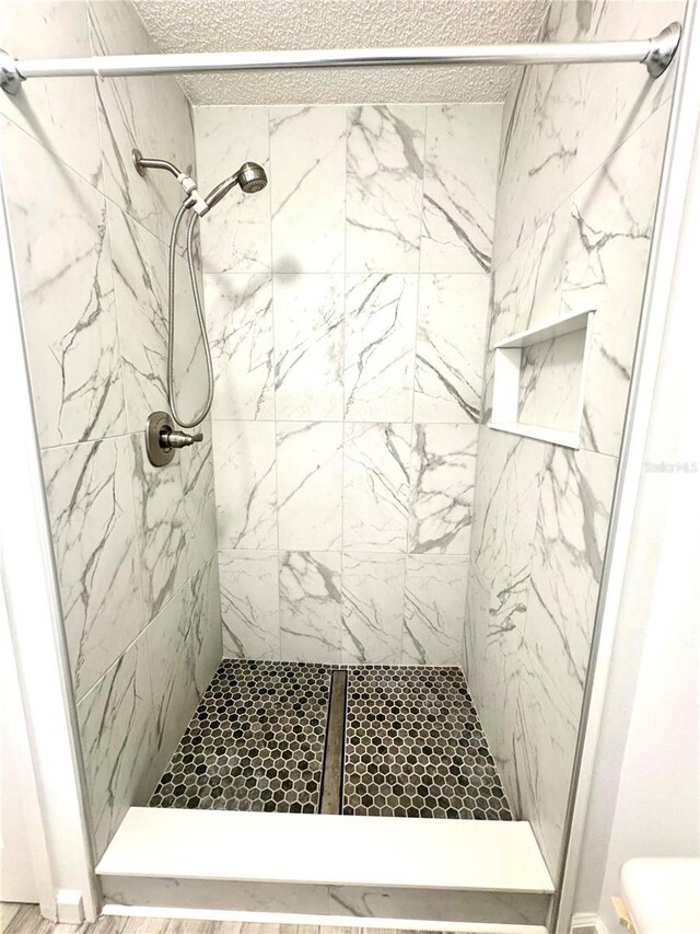 3181 Deltona Blvd, Spring Hill, FL 34606 - full bath with a stall shower and toilet