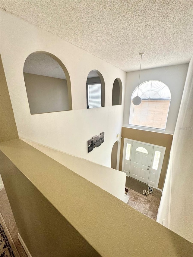 3181 Deltona Blvd, Spring Hill, FL 34606 - entrance foyer featuring a textured ceiling