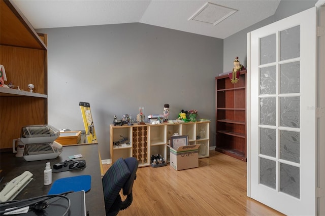 6303 Gentle Ben Cir, Wesley Chapel, FL 33544 - office space with wood finished floors, vaulted ceiling, and attic access