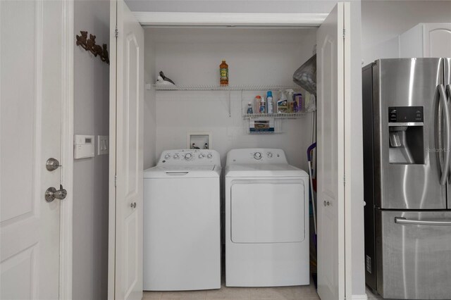 6303 Gentle Ben Cir, Wesley Chapel, FL 33544 - washroom featuring washing machine and clothes dryer