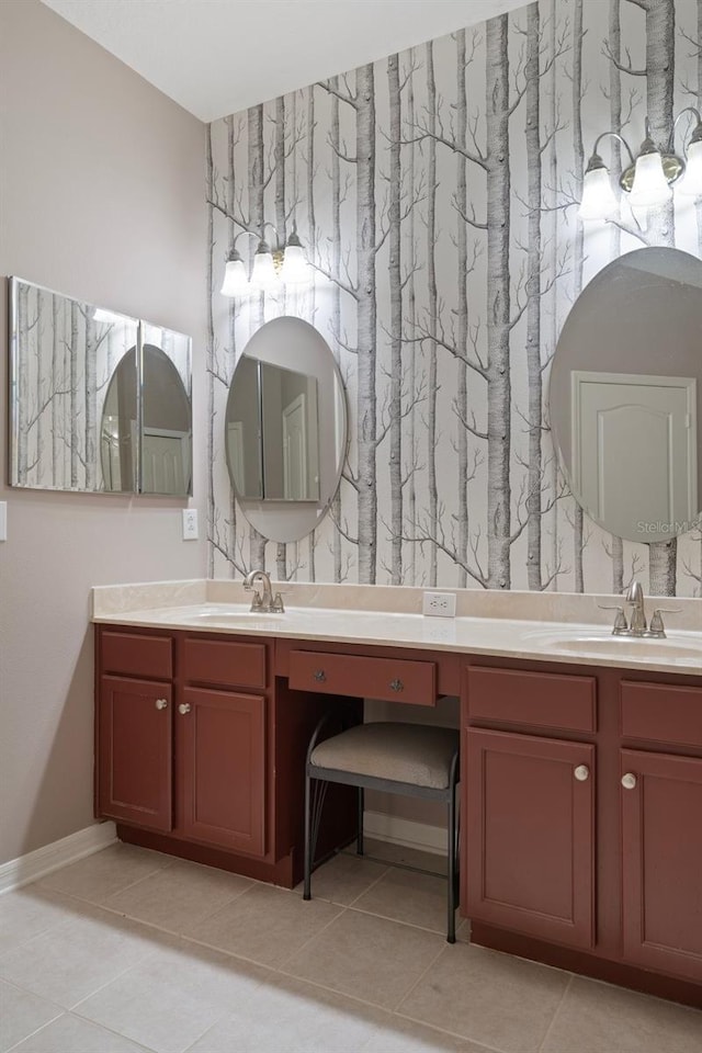 6303 Gentle Ben Cir, Wesley Chapel, FL 33544 - bathroom featuring double vanity, baseboards, and tile patterned flooring
