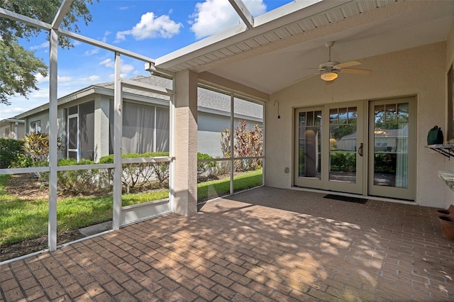 6303 Gentle Ben Cir, Wesley Chapel, FL 33544 - unfurnished sunroom featuring a ceiling fan, french doors, and vaulted ceiling