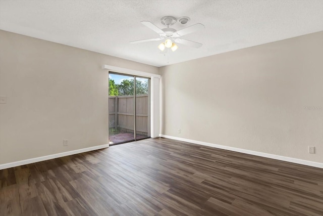 8630 Cattail Dr Unit 8630, Temple Terrace, FL 33637 - unfurnished room featuring a ceiling fan, dark wood-style floors, baseboards, and a textured ceiling