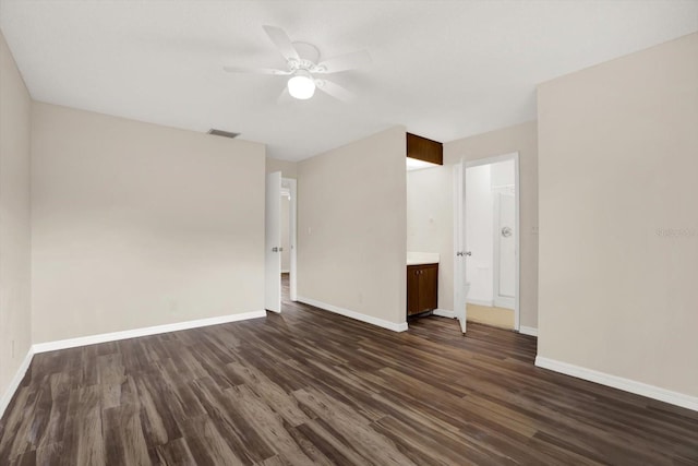 8630 Cattail Dr Unit 8630, Temple Terrace, FL 33637 - empty room featuring dark wood-style floors and baseboards
