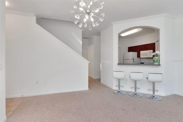 2173 Tuscany Trce Unit 8, Palm Harbor, FL 34683 - unfurnished living room with a chandelier, carpet, arched walkways, crown molding, and stairway