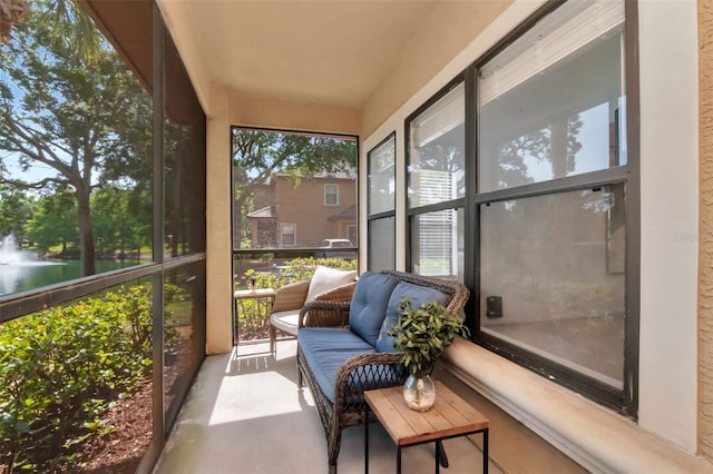 2173 Tuscany Trce Unit 8, Palm Harbor, FL 34683 - sunroom / solarium with a water view