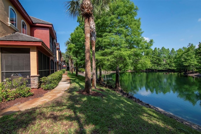 2173 Tuscany Trce Unit 8, Palm Harbor, FL 34683 - view of grassy yard with a water view