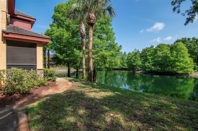 2173 Tuscany Trce Unit 8, Palm Harbor, FL 34683 - view of green lawn featuring a water view