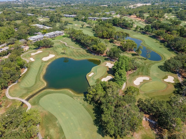 2173 Tuscany Trce Unit 8, Palm Harbor, FL 34683 - aerial view of property's location featuring a large body of water, a tree filled landscape, and a golf course