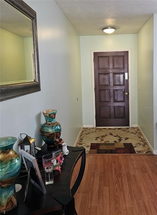 603 Southwood Cv, Brandon, FL 33511 - foyer featuring baseboards and a textured ceiling