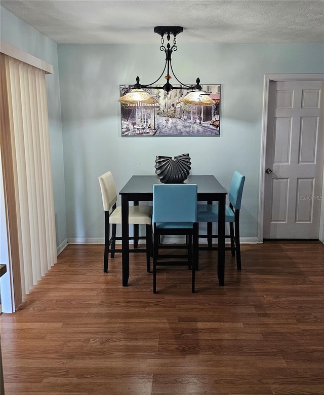 603 Southwood Cv, Brandon, FL 33511 - dining area featuring wood finished floors and baseboards