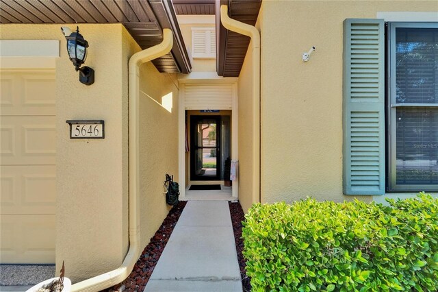 5646 Sunset Falls Dr, Apollo Beach, FL 33572 - entrance to property with stucco siding