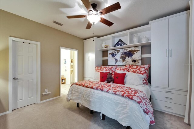 5646 Sunset Falls Dr, Apollo Beach, FL 33572 - bedroom with light carpet, baseboards, and ceiling fan
