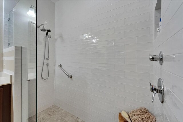 5646 Sunset Falls Dr, Apollo Beach, FL 33572 - bathroom featuring tiled shower and vanity