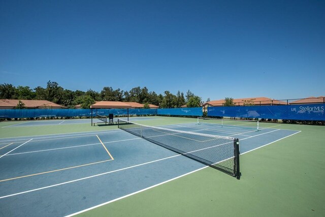 5646 Sunset Falls Dr, Apollo Beach, FL 33572 - view of tennis court featuring community basketball court