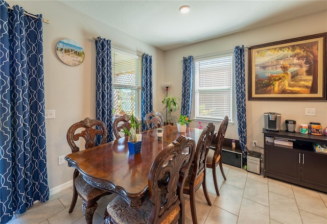 2247 Midnight Pearl Dr, Sarasota, FL 34240 - dining area featuring healthy amount of natural light and light tile patterned floors