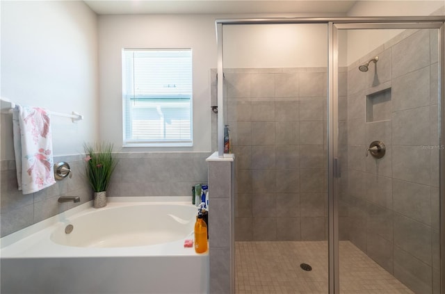 2247 Midnight Pearl Dr, Sarasota, FL 34240 - bathroom featuring a bath and a shower stall