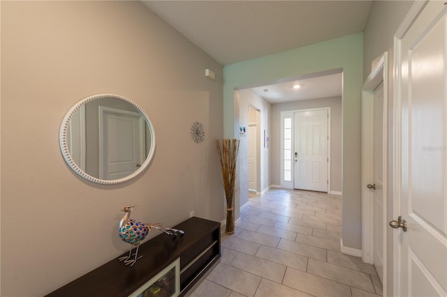 2247 Midnight Pearl Dr, Sarasota, FL 34240 - foyer entrance featuring light tile patterned flooring and baseboards