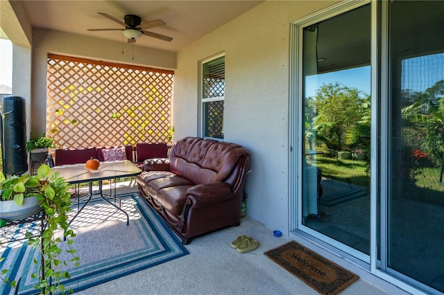 2247 Midnight Pearl Dr, Sarasota, FL 34240 - sunroom / solarium with ceiling fan and an outdoor living space