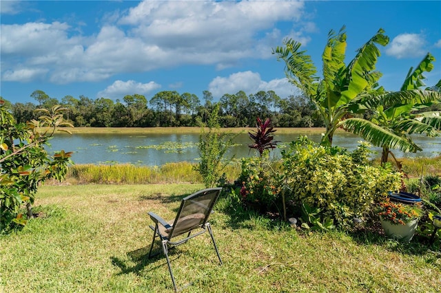 2247 Midnight Pearl Dr, Sarasota, FL 34240 - view of green lawn with a water view