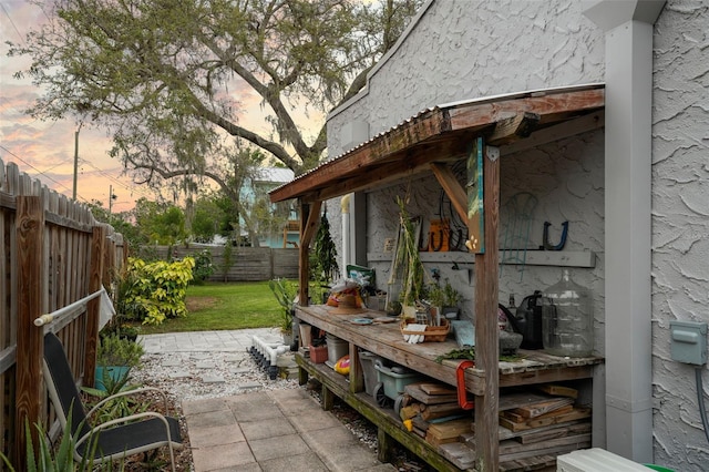 6251 4th Ave S, Saint Petersburg, FL 33707 - fenced backyard featuring a patio area
